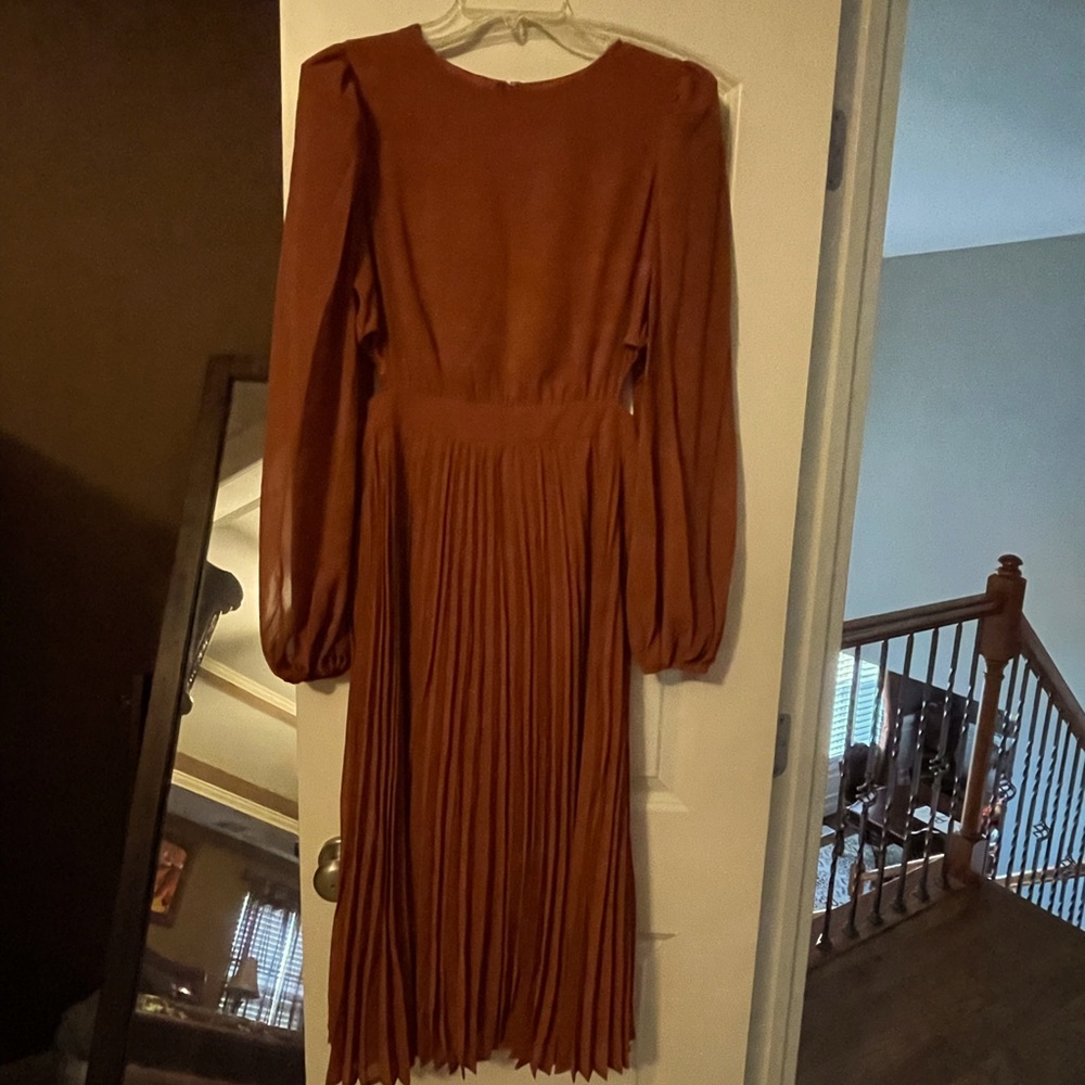 New never worn Charlton pleated cut out orange dress.